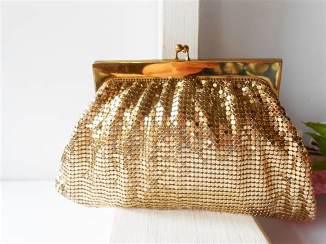 small gold clutch bag